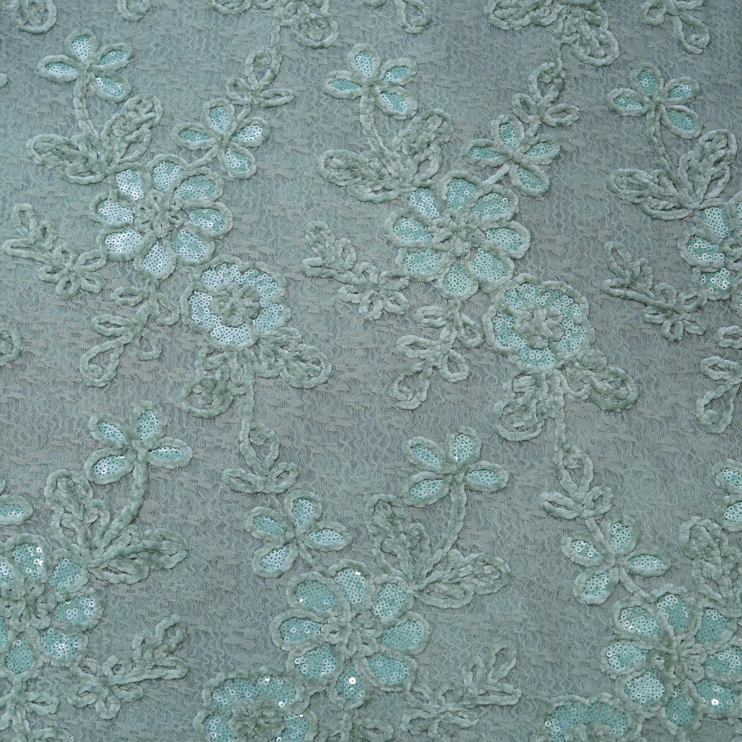 Premium Mint Green Floral Sequins Embroidered Net Fabric.