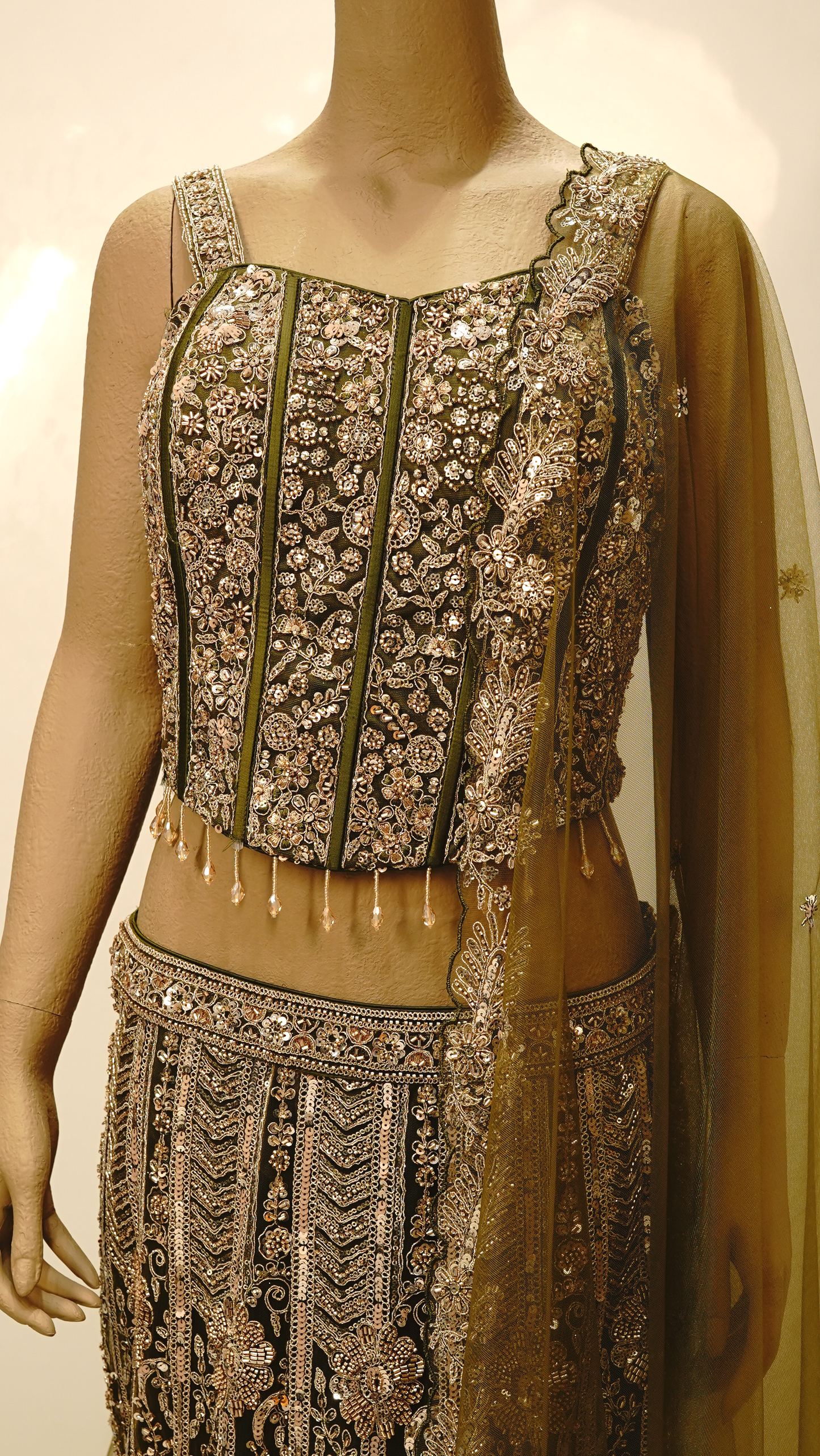 Olive Green Lehenga with Antique Gold & Champagne Embellishments
