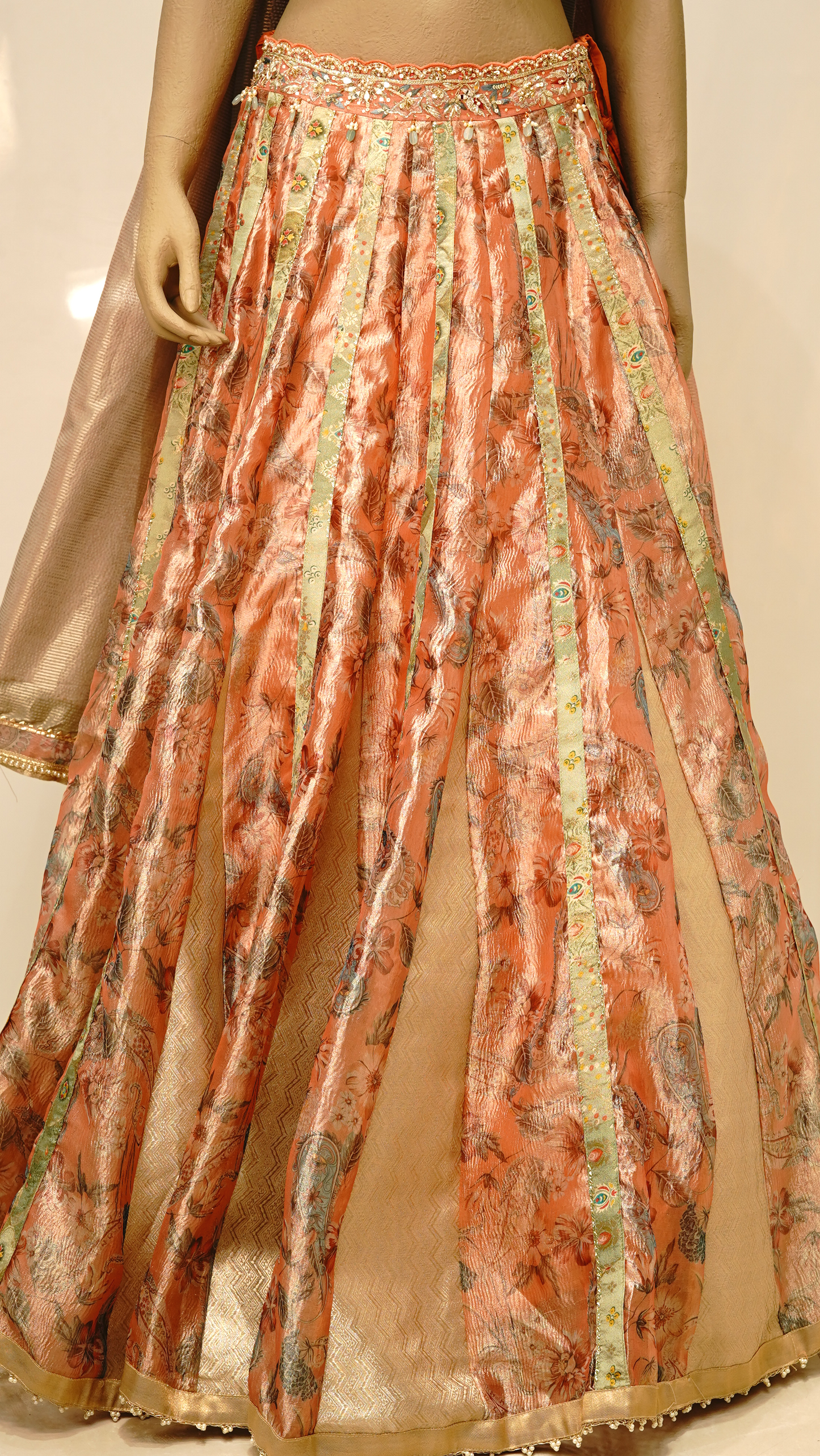 Peach lehenga with Soft Gold & Pastel Accents