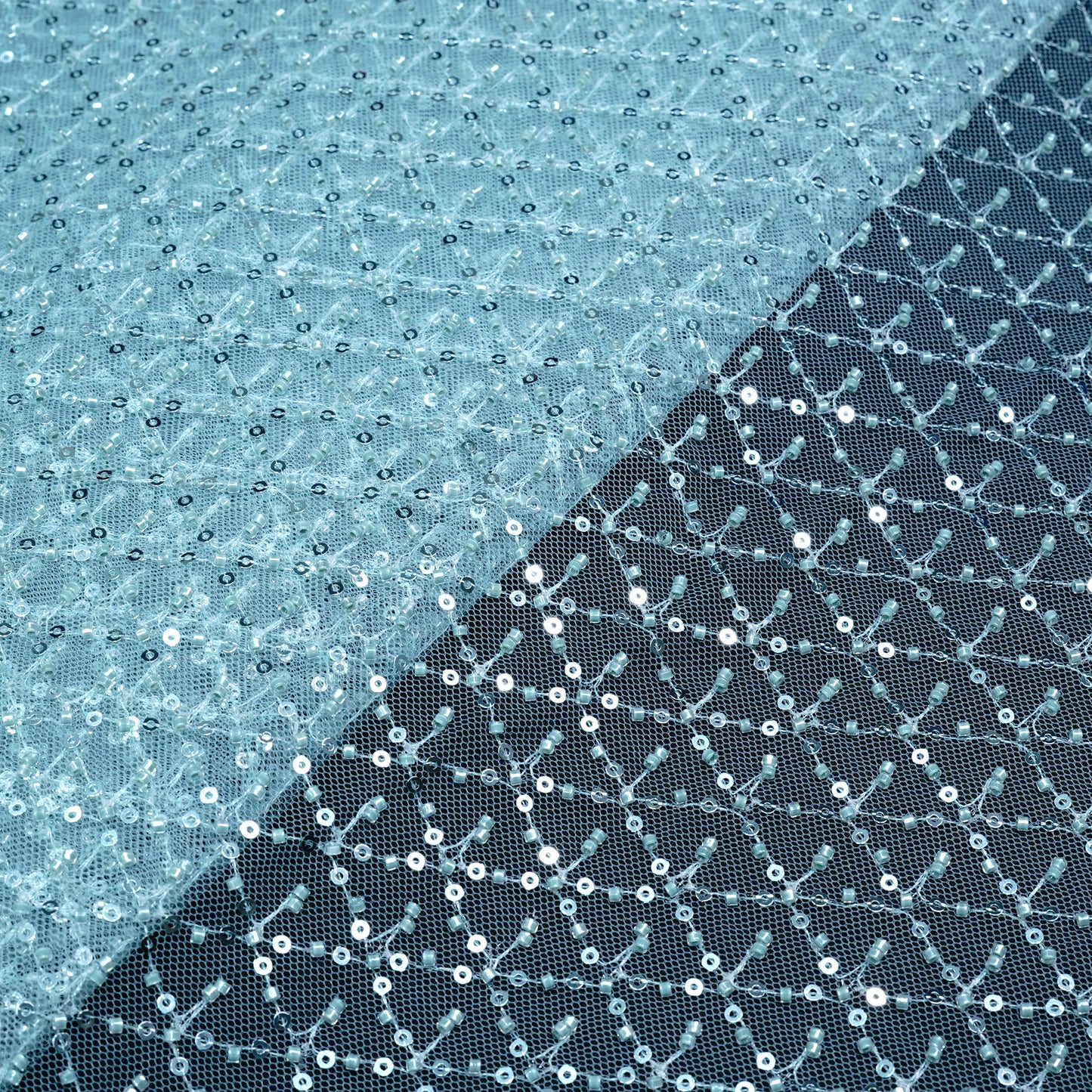 Elegant Ice Blue Embellished Net Fabric