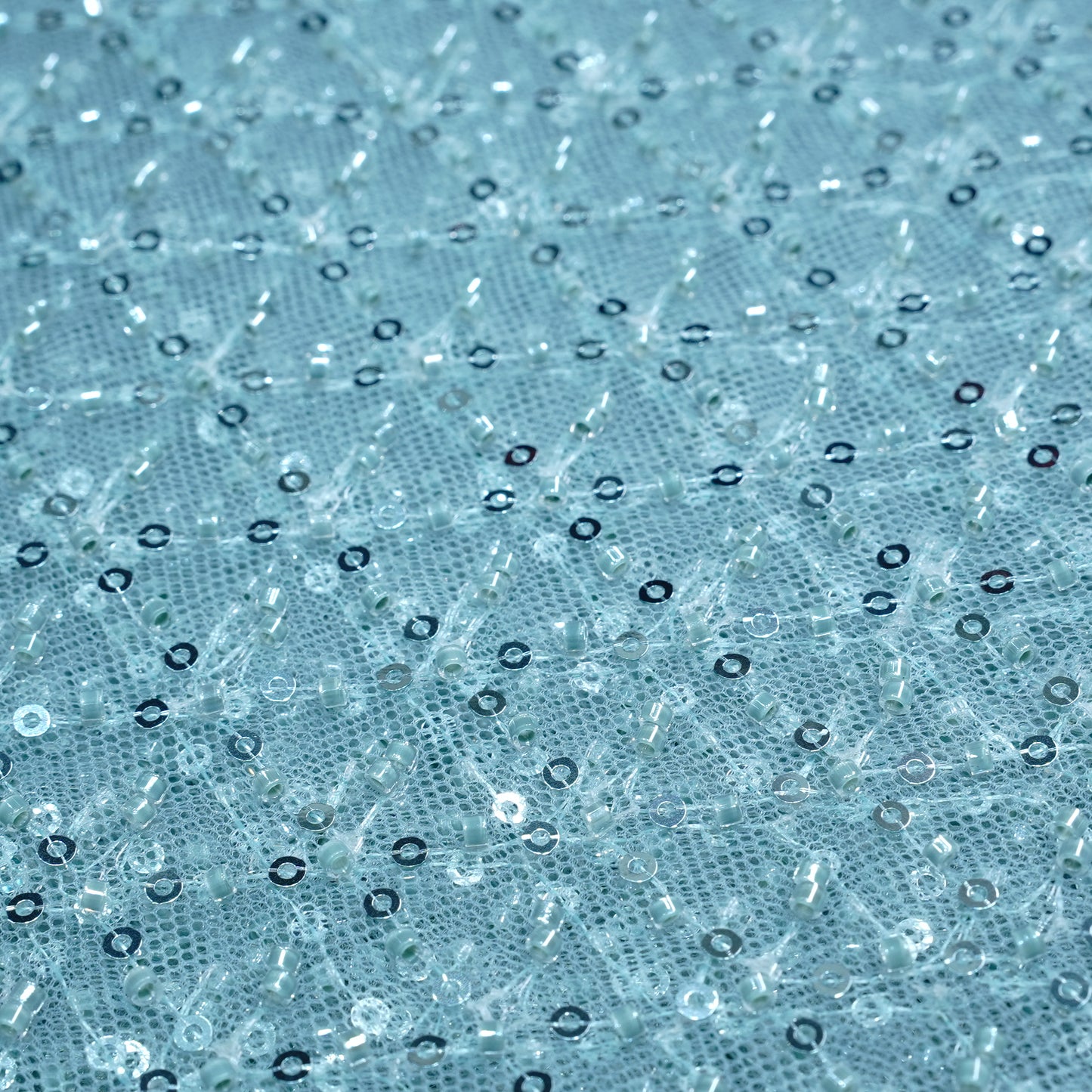 Elegant Ice Blue Embellished Net Fabric