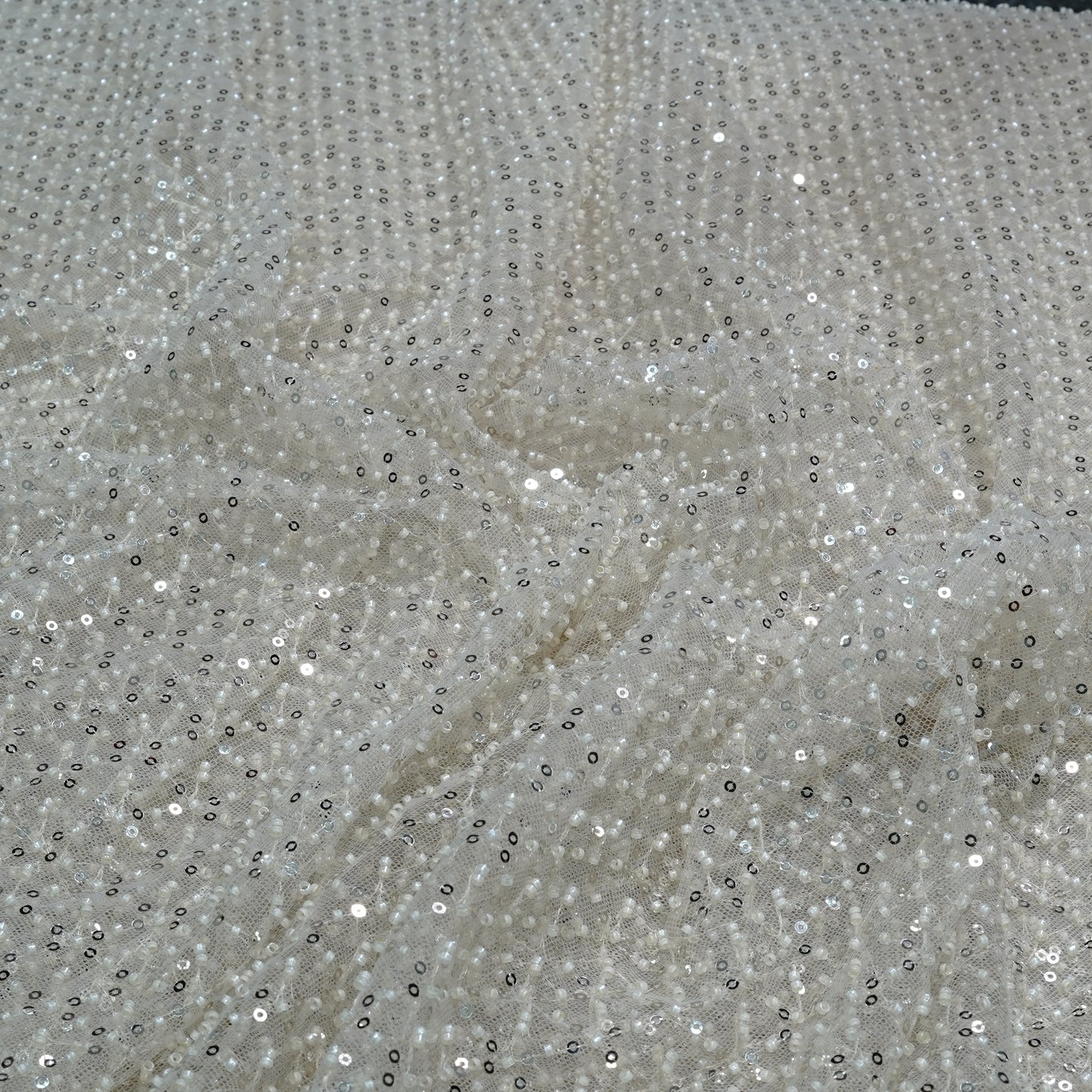 Elegant Ivory Shimmer Embellished Net Fabric