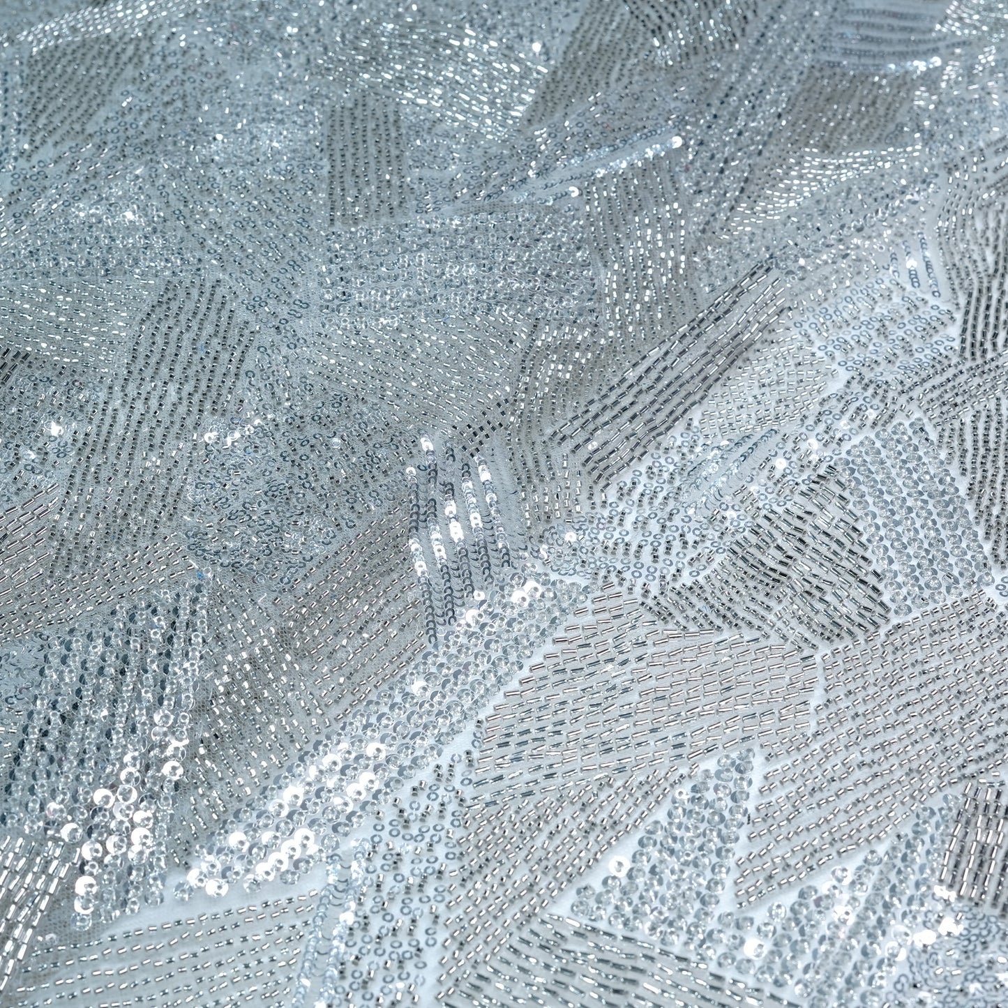Elegant Silver Embellished Net Fabric
