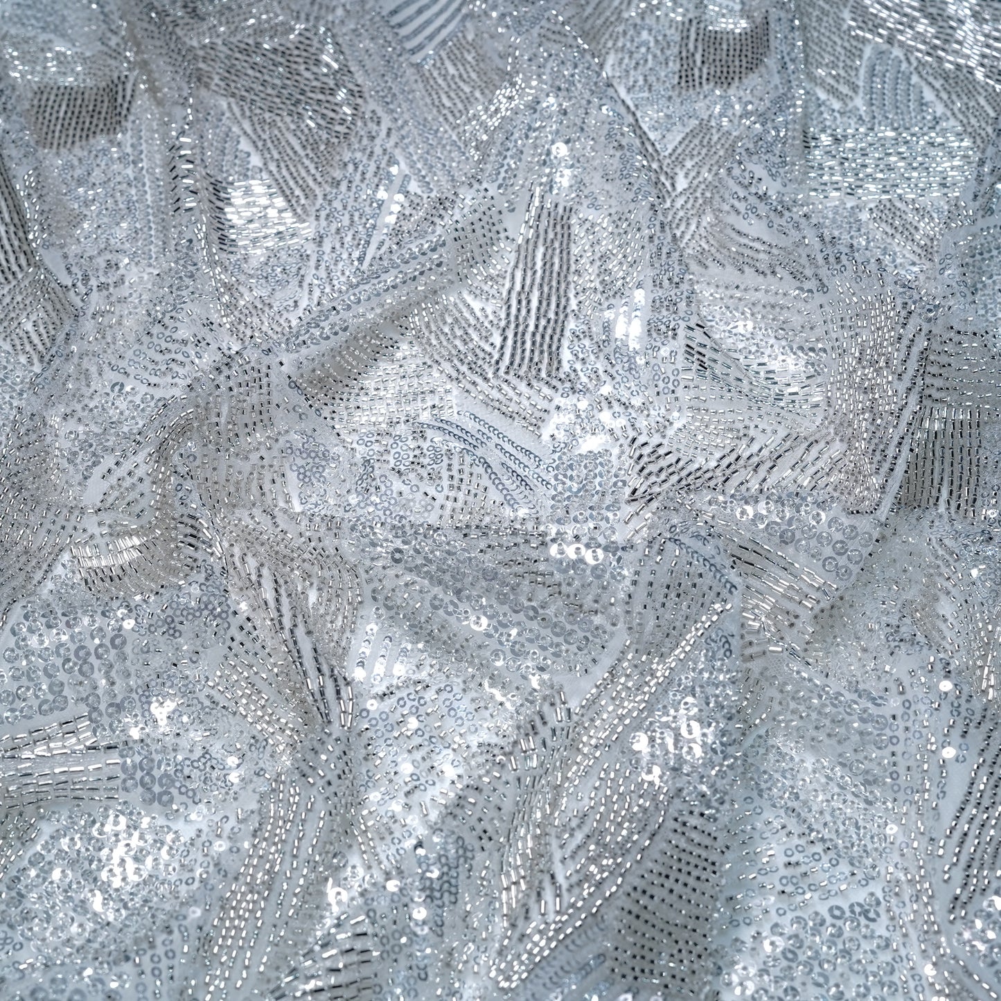 Elegant Silver Embellished Net Fabric