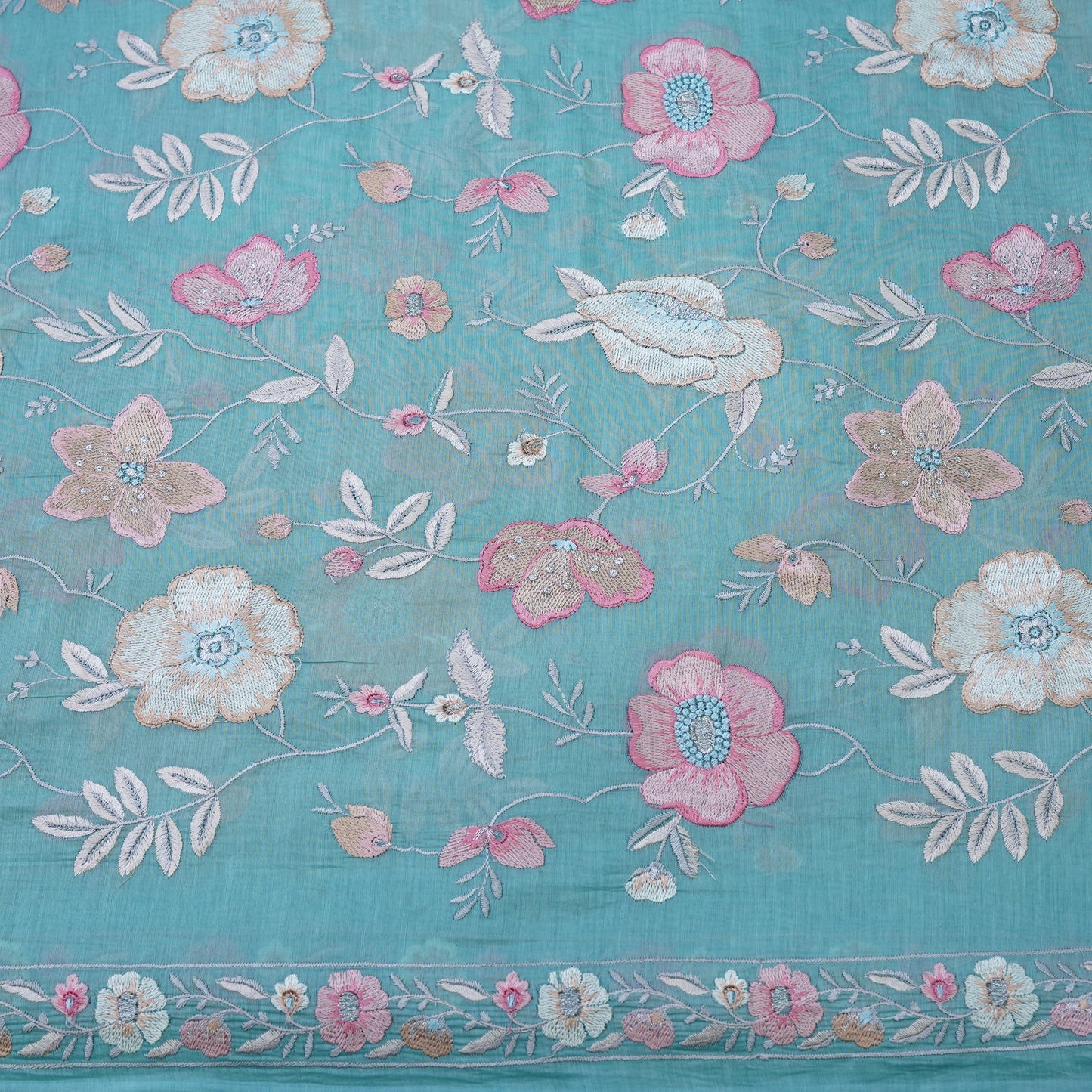 Aqua Blue Floral Embroidered Fabric .