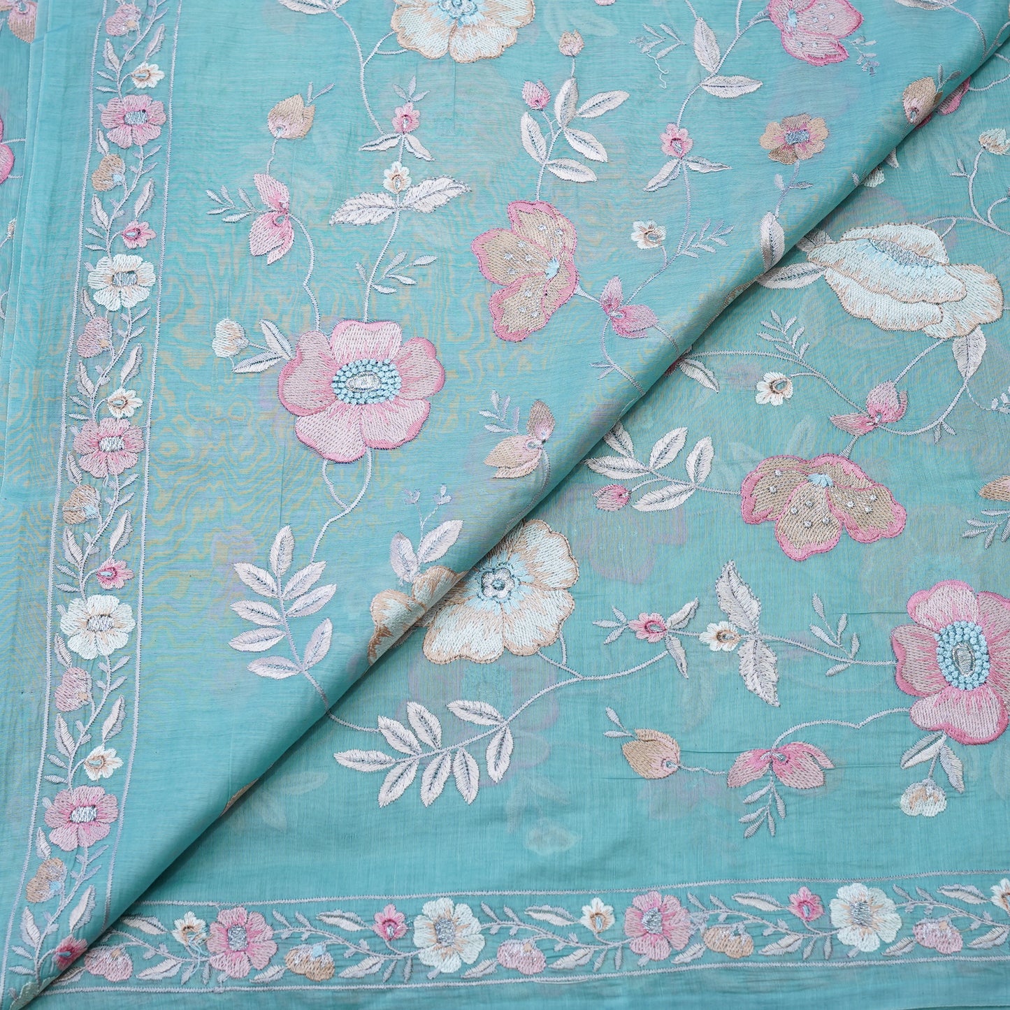 Aqua Blue Floral Embroidered Fabric .
