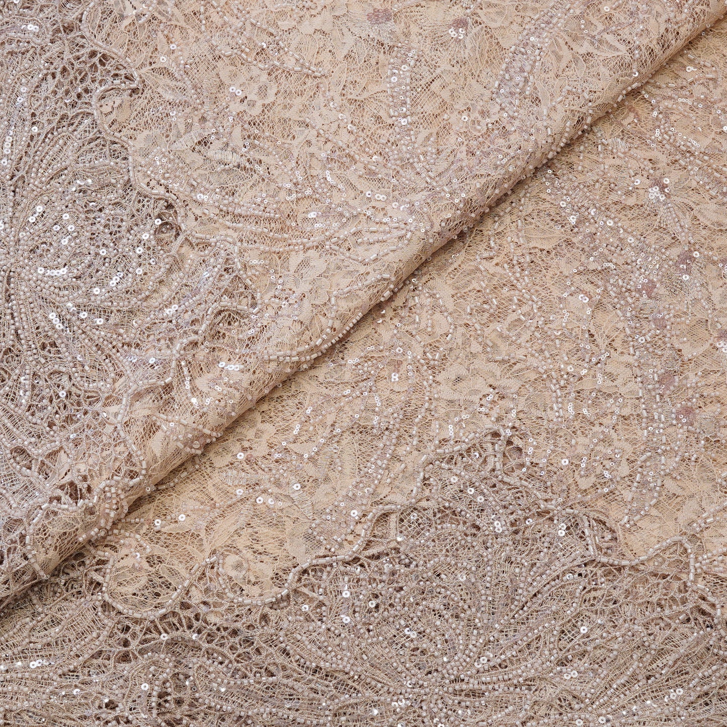 Luxury Nude Beige Net Fabric with Heavy Sequins & Cutdana Embroidery.