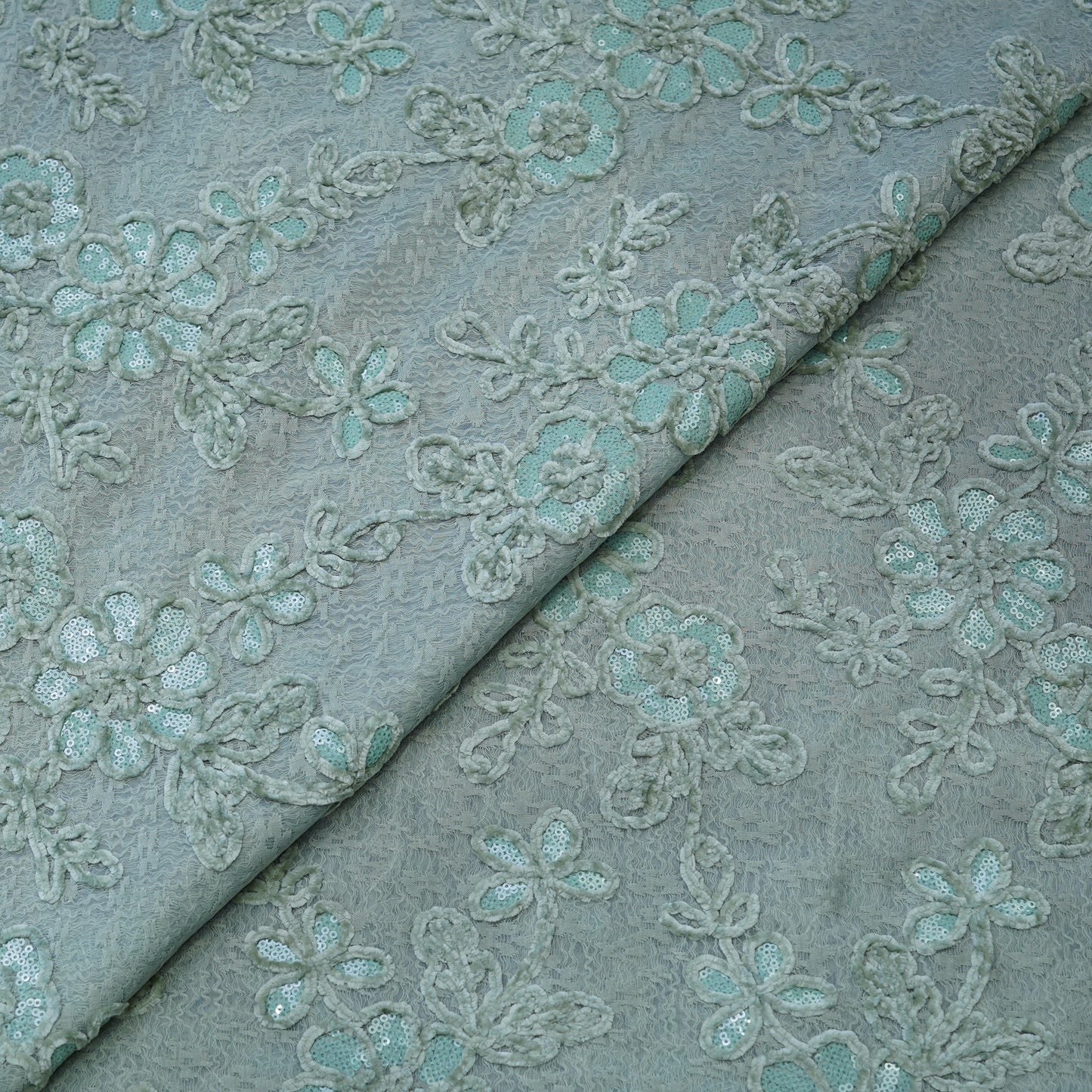 Premium Mint Green Floral Sequins Embroidered Net Fabric.