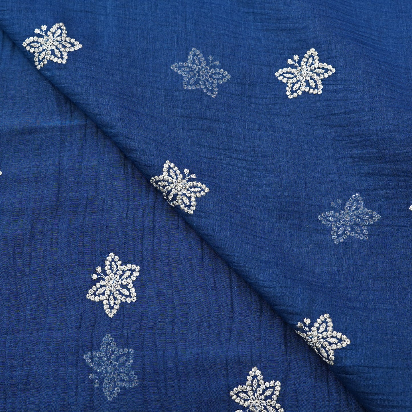 Royal Blue Butti Thread Embroidered Fabric.
