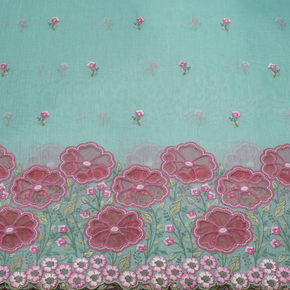 Aqua Blue Floral Border Embroidered Mul Chanderi Fabric.