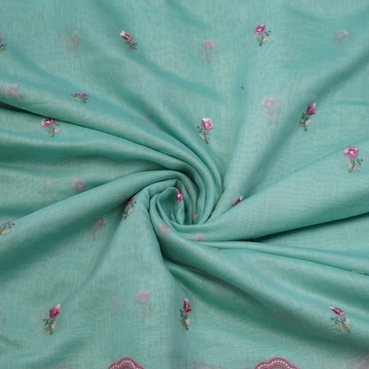 Aqua Blue Floral Border Embroidered Mul Chanderi Fabric.