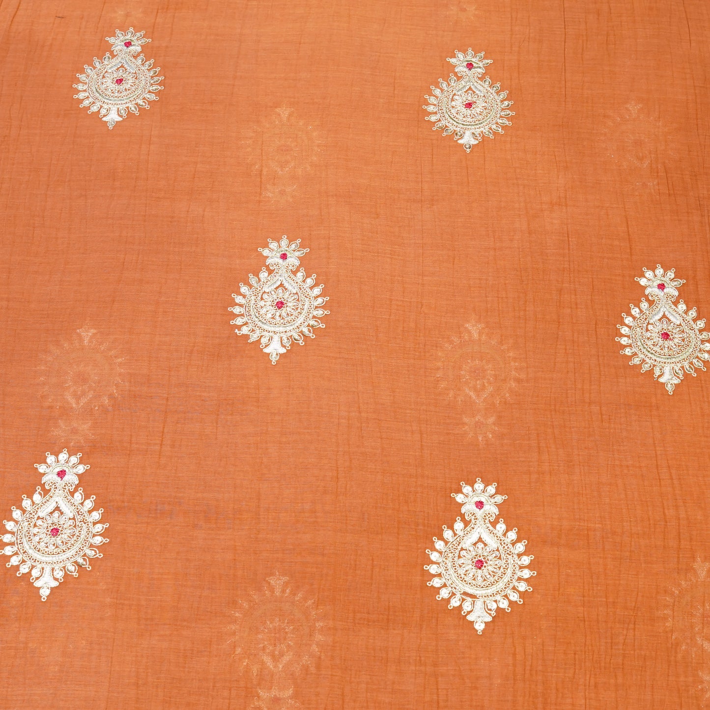 Elegant Rust Orange Embroidered Fabric with Paisley Butti.
