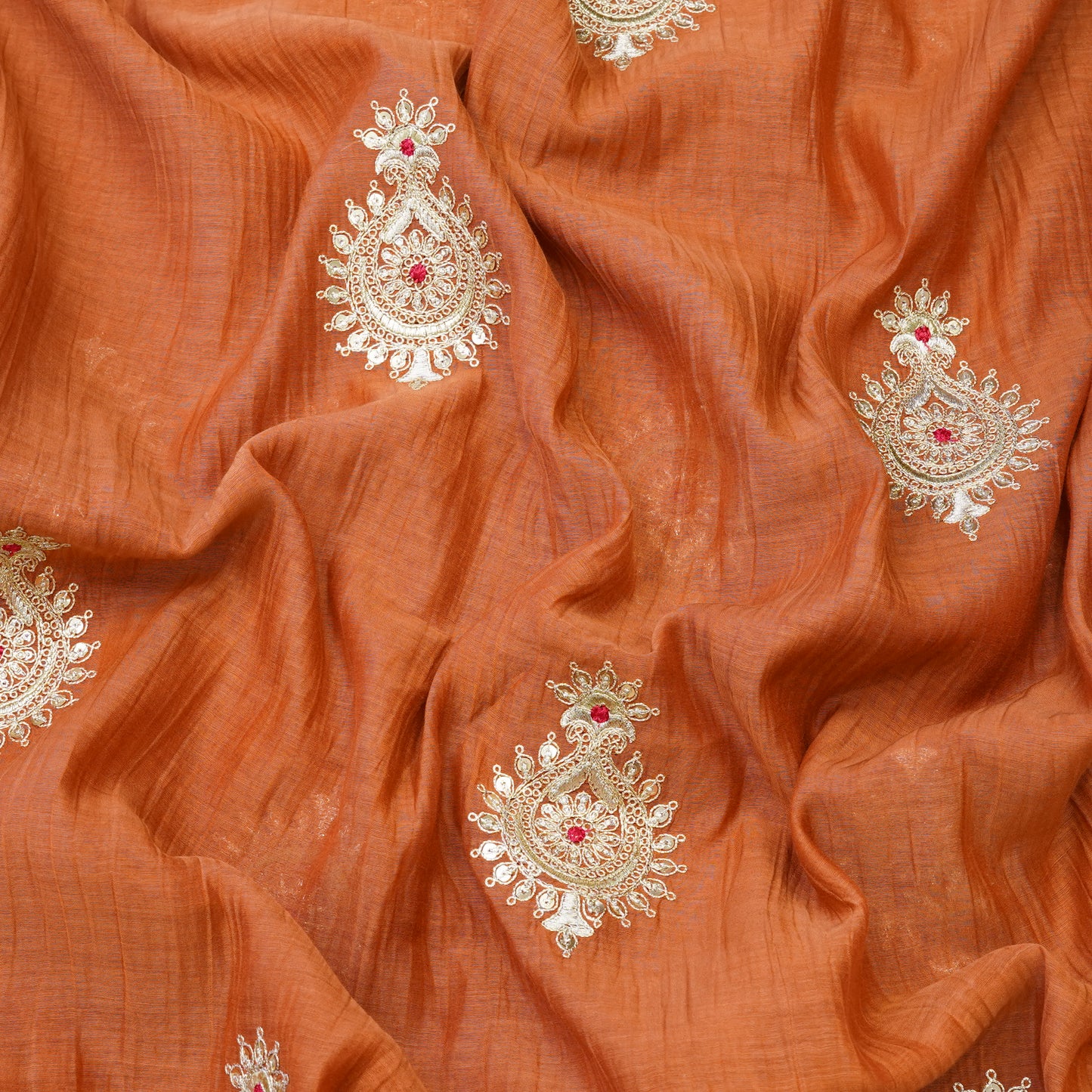 Elegant Rust Orange Embroidered Fabric with Paisley Butti.