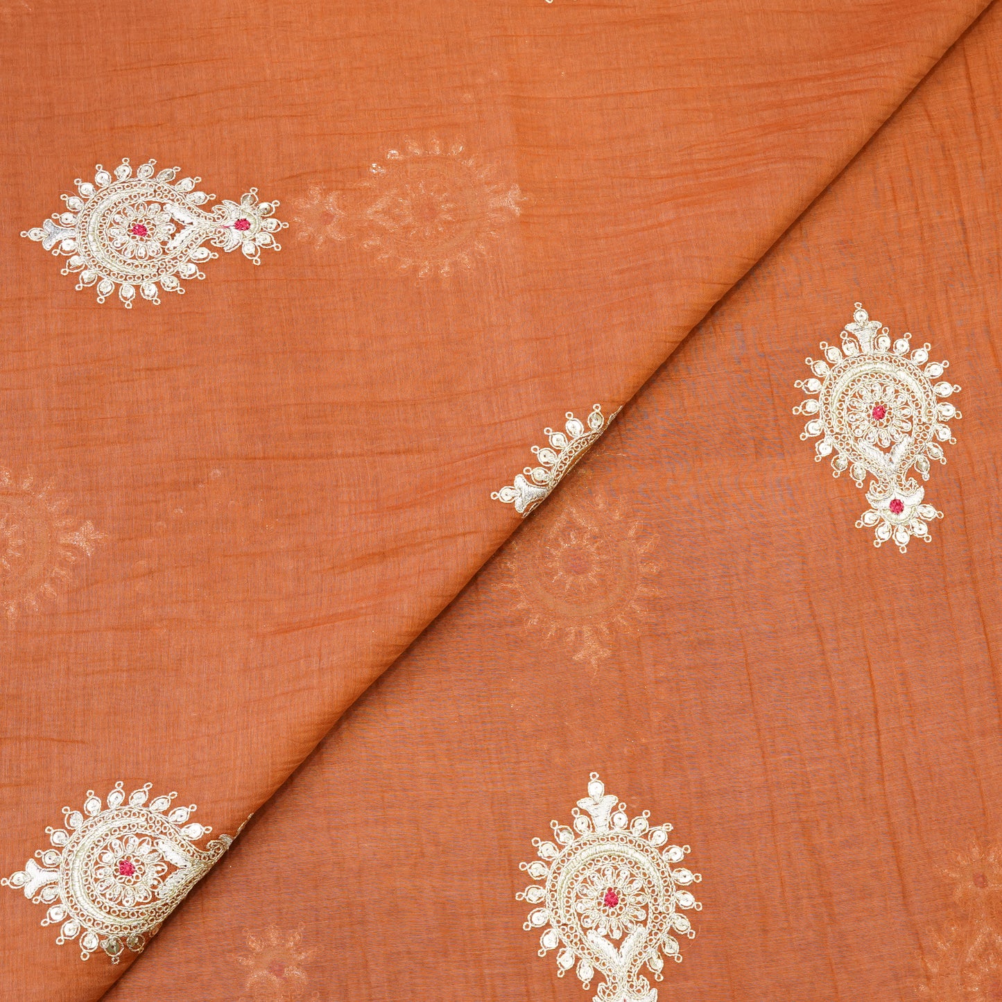 Elegant Rust Orange Embroidered Fabric with Paisley Butti.