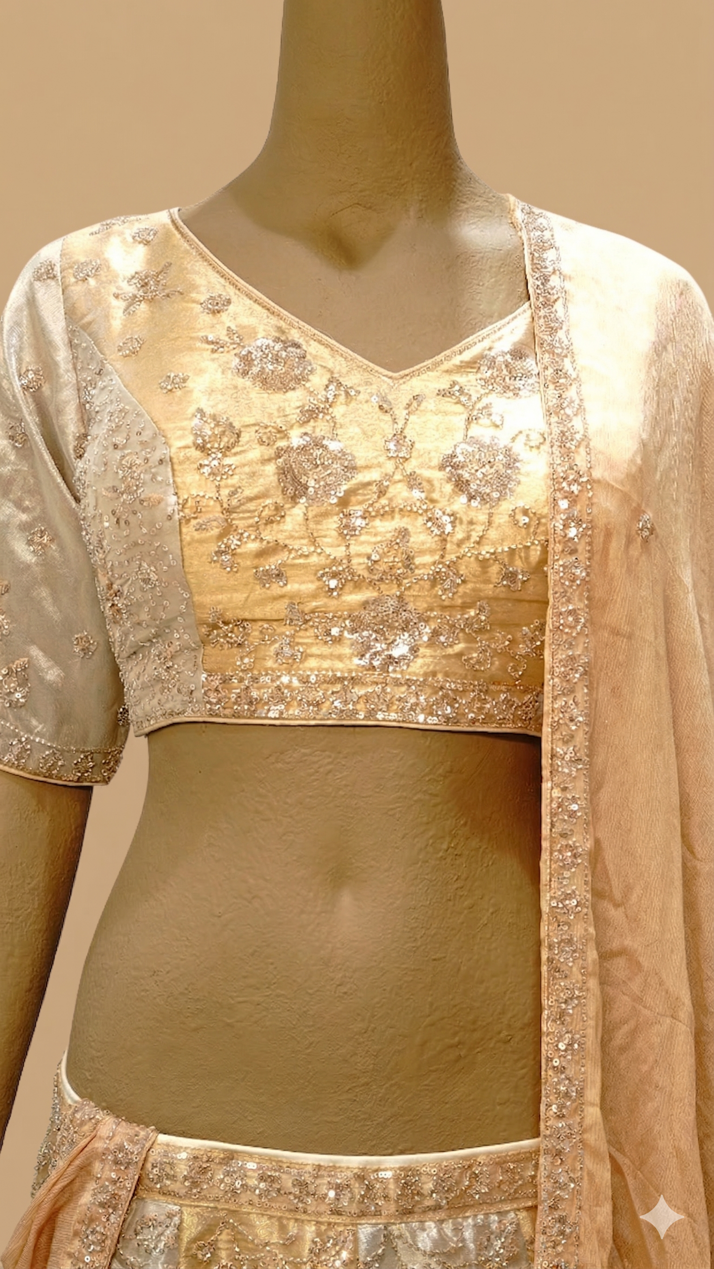 Champagne Glimmer: Hand-Embellished Metallic Lehenga Set